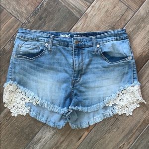 Distressed medium wash with lace detail